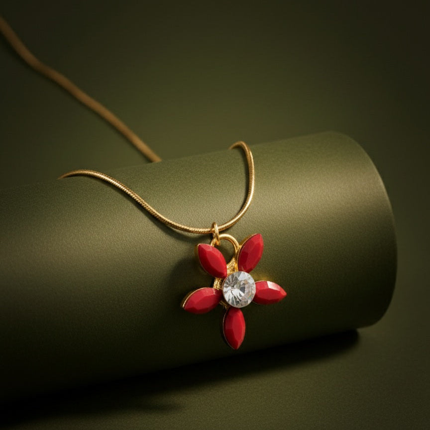 Handcrafted Stellar Flower Necklace in Red featuring a central . pure gold plating.