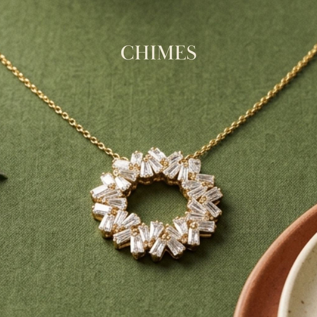 Handcrafted Solstice Halo necklace featuring a circular pendant of radiant baguette-cut crystals on a delicate gold chain.
