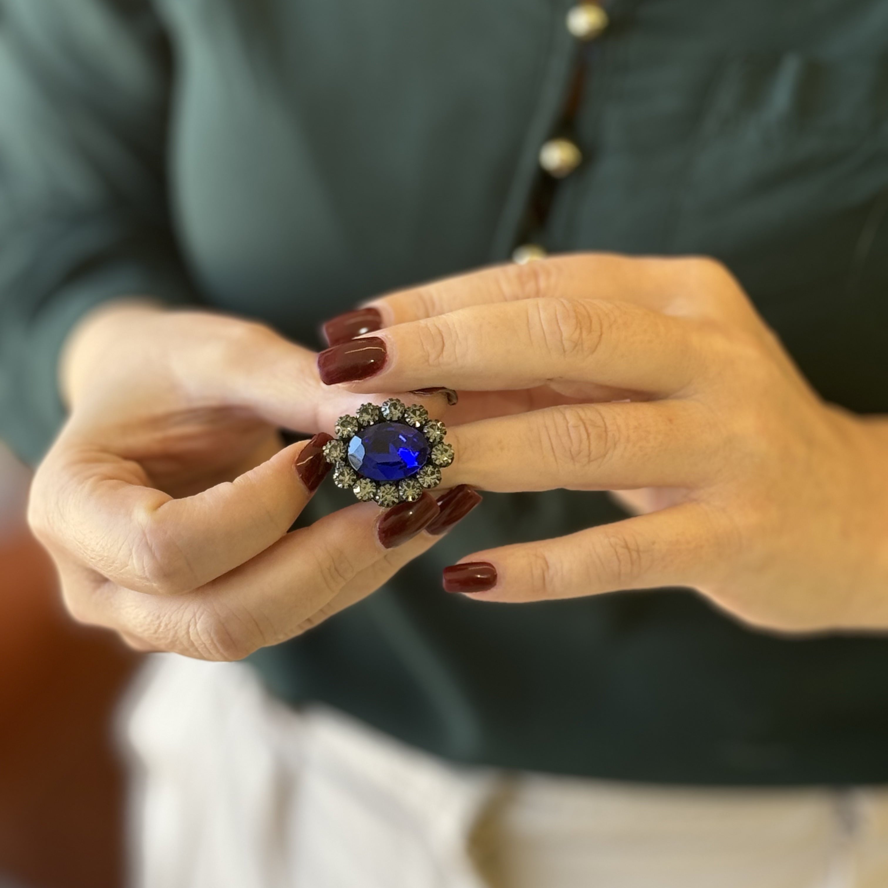 Royal Sapphire Victoria Ring, handcrafted with a deep blue crystal and Swarovski halo in pure gold plating.